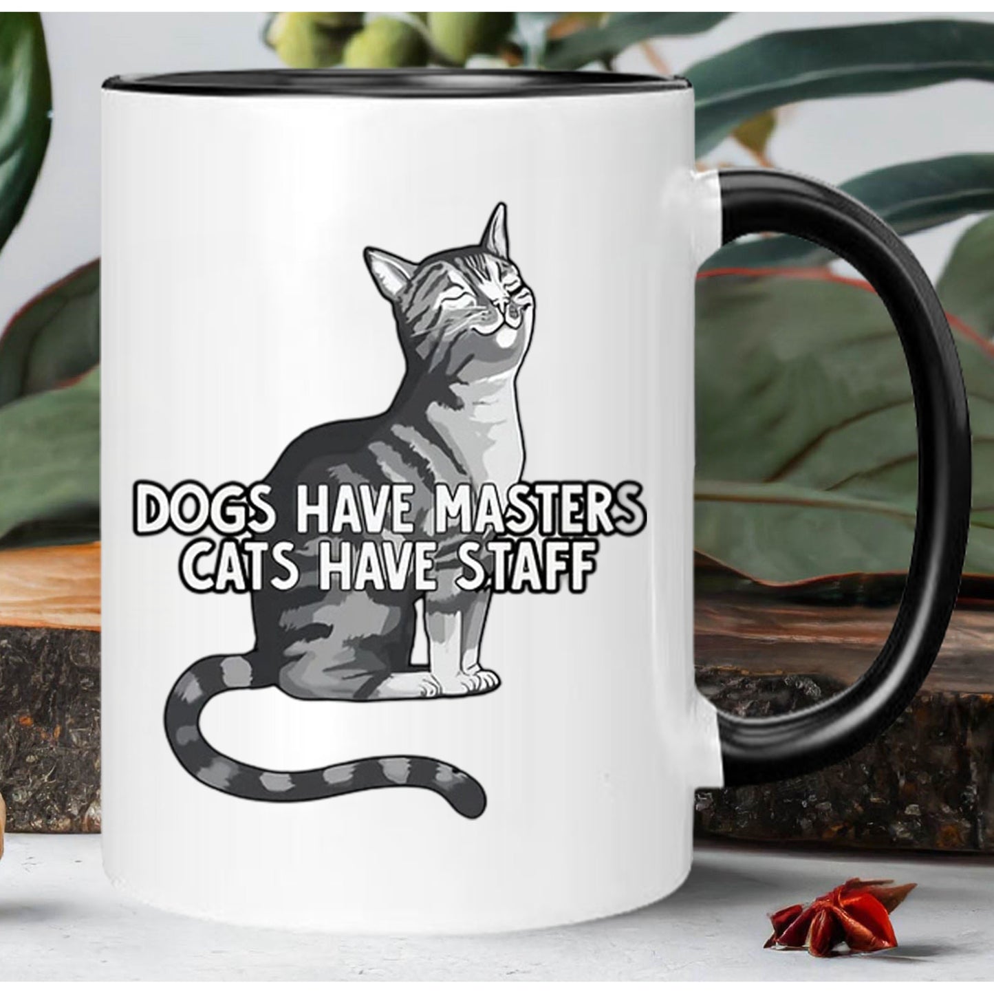 Katten mok “Dogs have masters, Cats have staff”