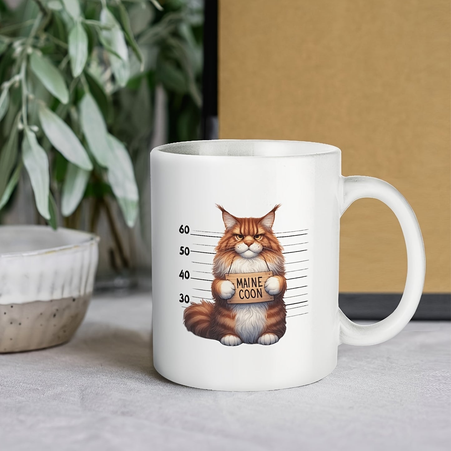 Mok kat Maine Coon als gevangene