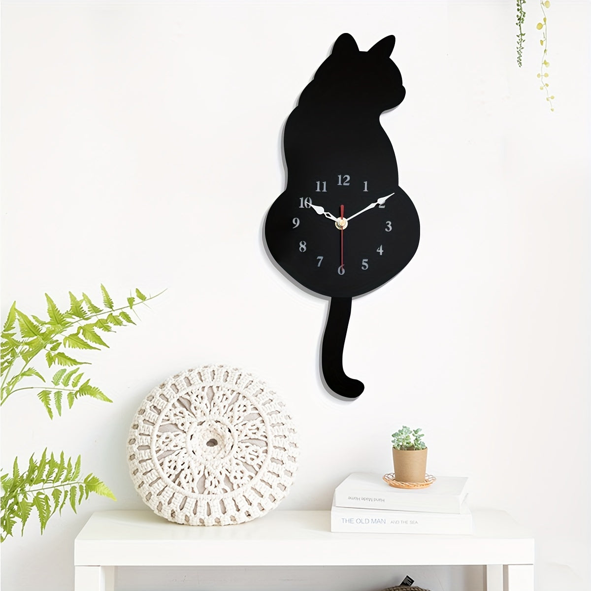 Stille klok zwarte kat met bewegende slinger, 42 x 18 cm