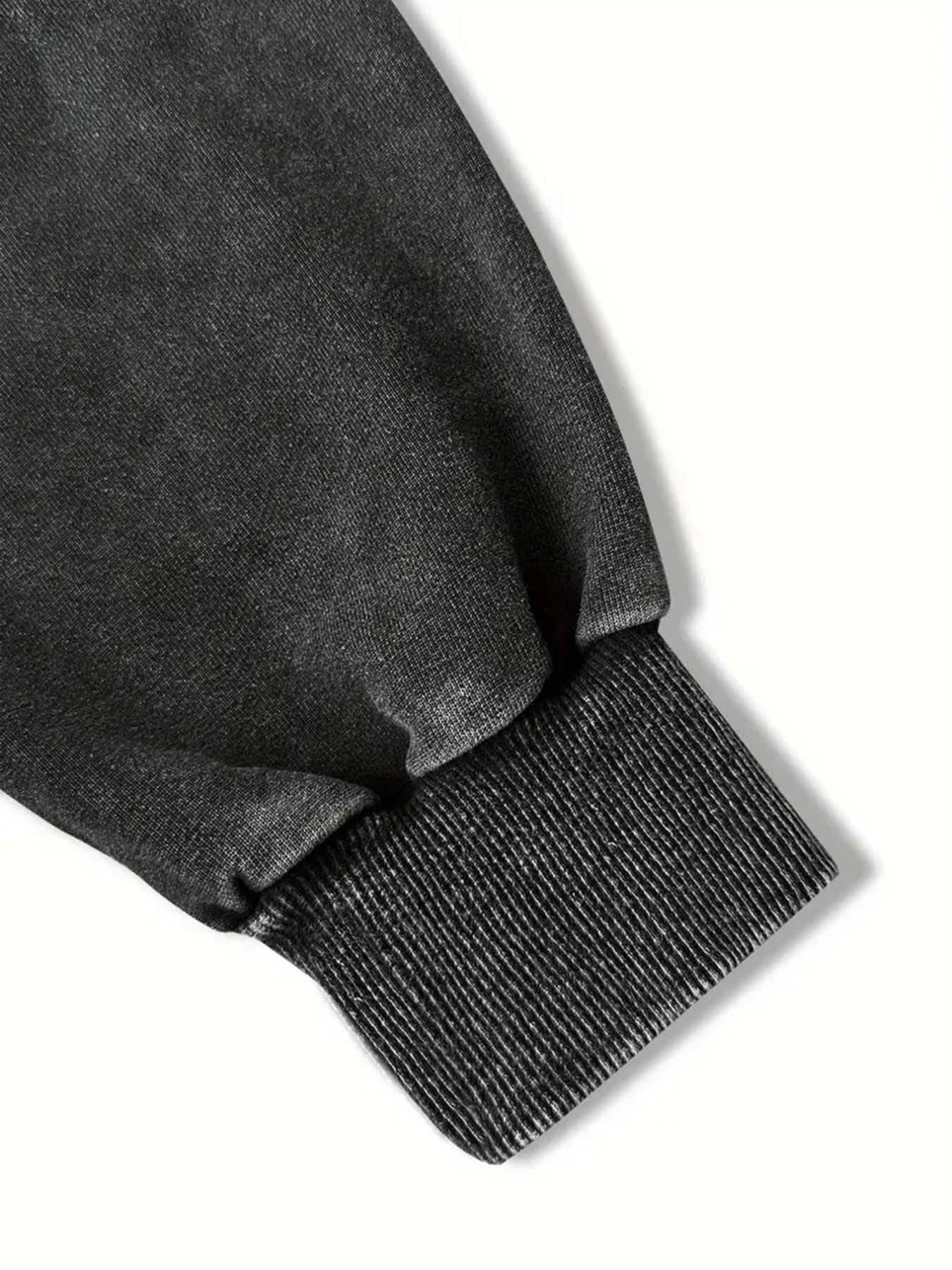 Close-up van de geribbelde boord van de mouw van de vintage kattentrui